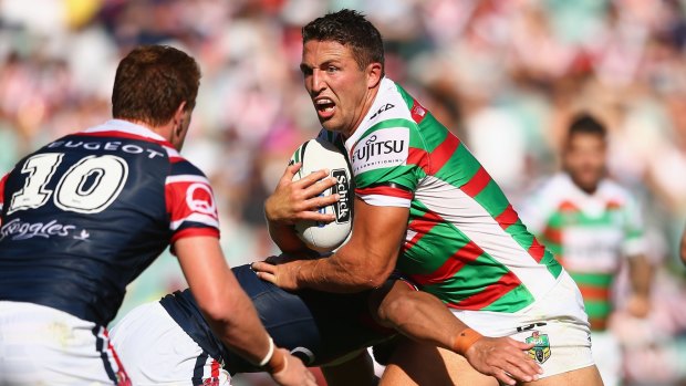 Rousing return: Sam Burgess runs the ball during the round one NRL match between the Sydney Roosters and the South Sydney Rabbitohs at Allianz Stadium.