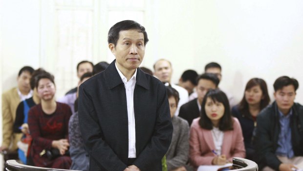 Vietnam's prominent blogger Nguyen Huu Vinh on trial in Vietnam last month. A court in Hanoi sentenced Vinh, a former police officer and a son of a late government minister, to five years in prison for posting anti-state writings.