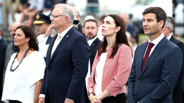 Jenny Morrison, Australian Prime Minister Scott Morrison, New Zealand Prime Minister Jacinda Ardern and Clarke Gayford take part in a wreath laying ceremony at Auckland Museum.