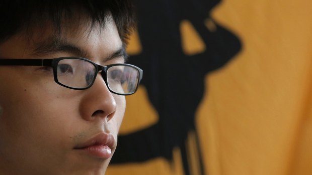 'I am optimistic': Joshua Wong outside a Hong Kong court earlier this year.