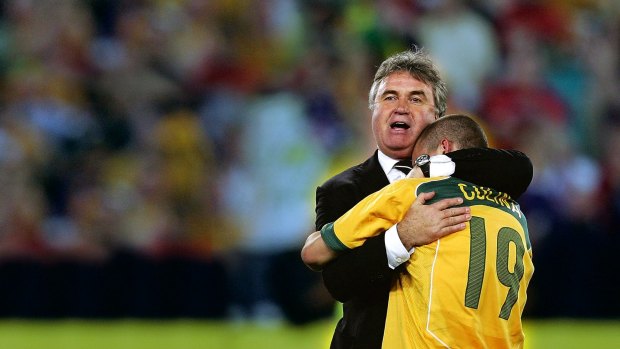 Good times: Coach Guus Hiddink savours Australia's qualification for the 2006 World Cup.
