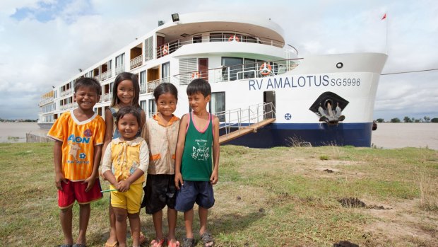 APT's AMALotus meets new friends on the Mekong River.