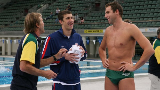 Way back: Michael Phelps talks with Grant Hackett at poolside during training at the 2007 Sydney International Aquatic Centre.