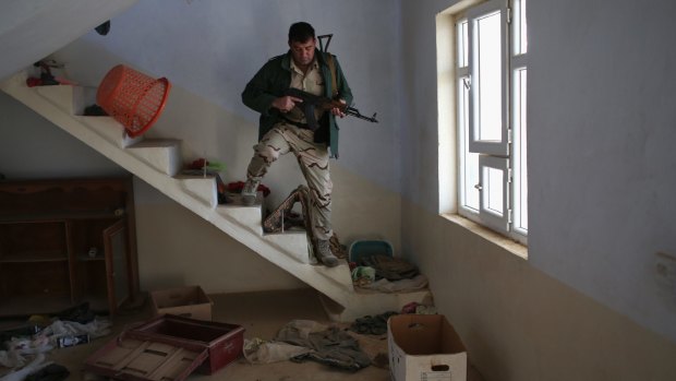 Peshmerga forces in Sinjar, Iraq, late last year. 