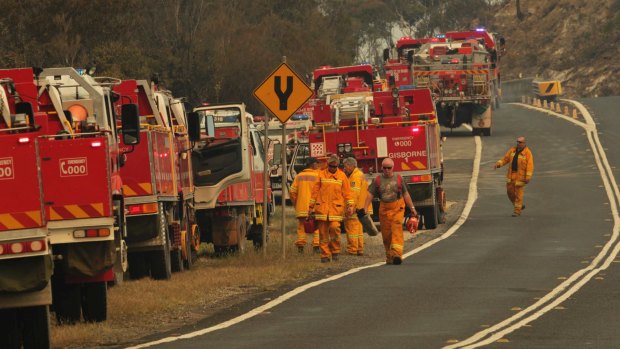 Rural Fire Service volunteers fight a blaze near Mount Victoria in October 2013. 