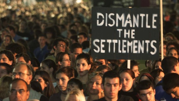 Israelis take part in a rally marking the sixth anniversary of Rabin's assassination. 