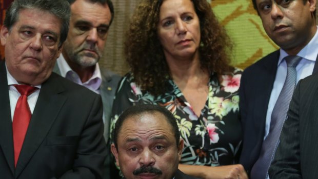The acting speaker of the lower house of Brazil's Congress Waldir Maranhao, centre, annulled last month's vote.