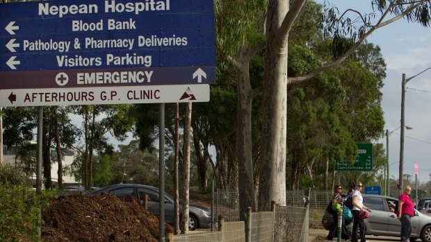 A police officer and security guard became involved in an altercation  with a man at Nepean Hospital after receiving reports a doctor had been threatened with scissors.