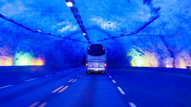 The lighting inside Laerdal Tunnel in Norway has been designed to replicate a sunrise so drivers don't get bored.