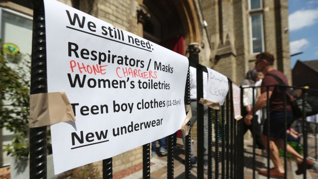 A sign at Notting Hill Methodist Church where items are being collected to assist people affected by the fire that engulfed the Grenfell Tower on Wednesday.