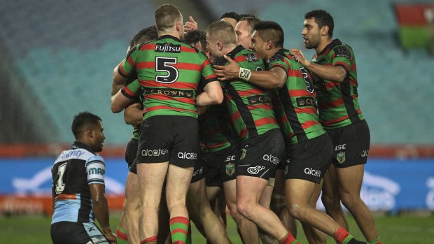 Bunnies boilover: South Sydney players celebrate during their win over Cronulla at ANZ Stadium.