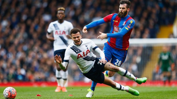 Dele Alli, of Tottenham Hotspur, is challenged by Crystal Palace's Joe Ledley in their FA Cup game at White Hart Lane on Sunday.