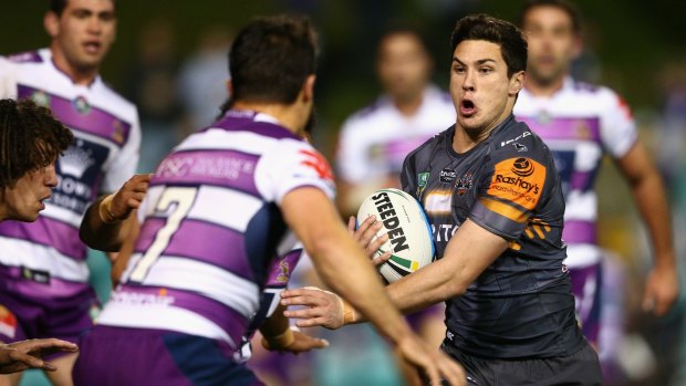 Boilover: Tigers pivot Mitchell Moses runs the ball against the Melbourne Storm at Leichhardt Oval.