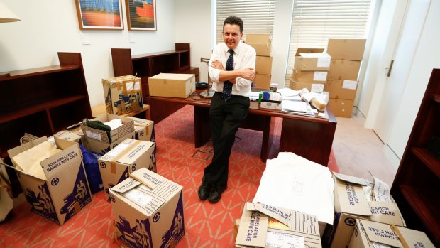 Senator Nick Xenophon with the packing boxes in his office, at Parliament House last week.