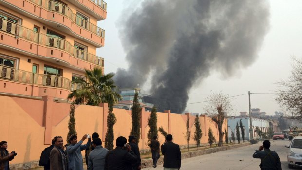 Smokes rises after a deadly suicide attack in Jalalabad, east of Kabul, Afghanistan on Wednesday.