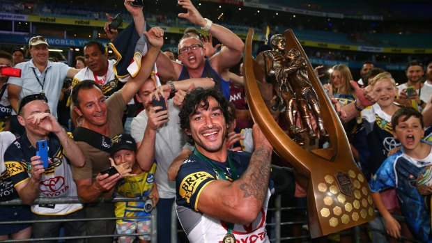 Famous night: Johnathan Thurston of the Cowboys celebrates winning last year's grand final.