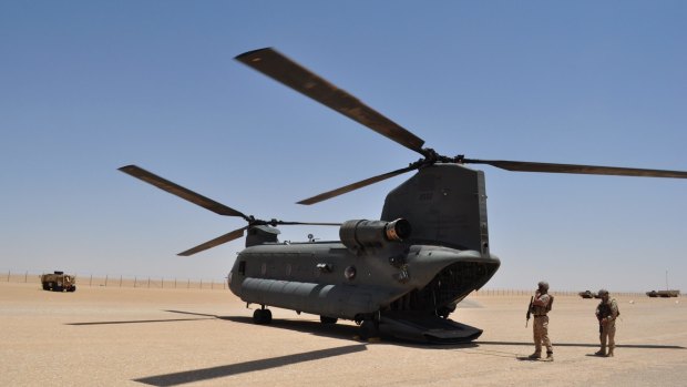 An Emirati Chinook military helicopter lands at a military base near Safer, Yemen, on Monday. 