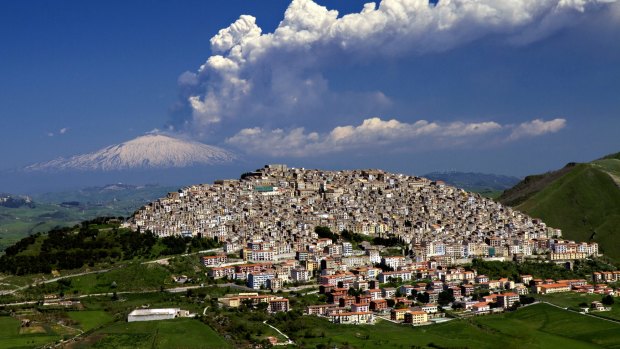 Hot picks: Gangi, Sicily, with Mount Etna erupting in the background.