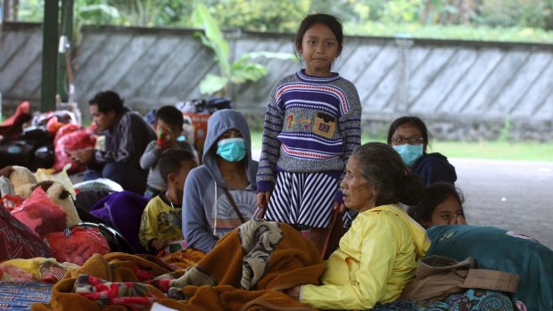 Villagers rest at an evacuee camp in Rendang, Bali, Indonesia.