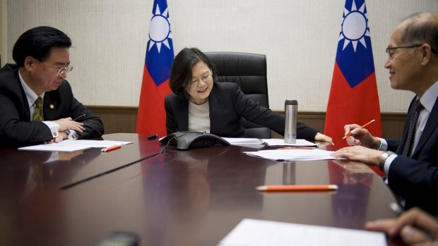 December 2016: Tsai Ing-wen (centre)  speaks on the phone with US President-elect Donald Trump, prompting an angry backlash from Beijing.