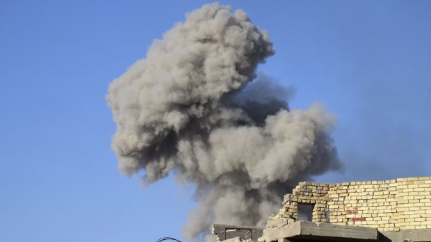 Smoke rises from Islamic State positions following a US-led coalition airstrike in Ramadi.