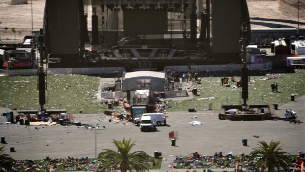 The day after: Debris is strewn across the site of the music festival. 