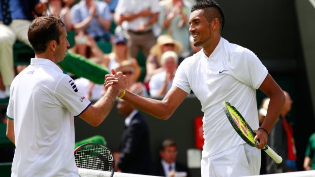 Kyrgios and Stepanek shake hands after their match on Tuesday.