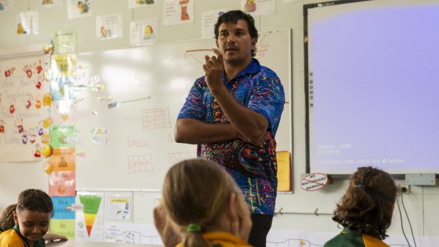 Juan Walker teaching students at Mossman State School the local Indigenous language. Walker also runs tour company Walkabout Cultural Adventures in Queensland.