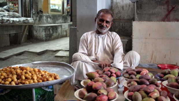 A fruit seller in the Old Mutrah Souq.