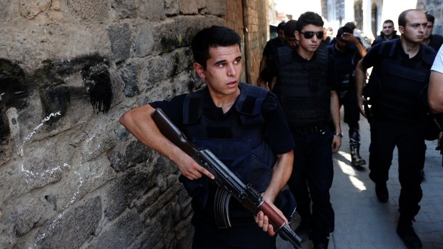Heightened conflict: Turkish police officers conduct a security operation in Diyarbakir.