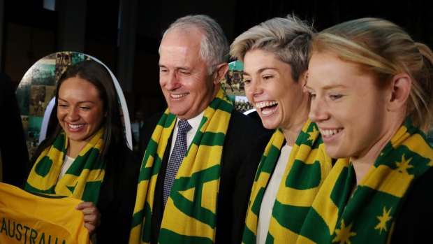 Prime Minister Malcolm Turnbull with Matildas Kyah Simon, Michelle Heyman and Clare Polkinghorne at Parliament House for the announcement of the 2023 bid.