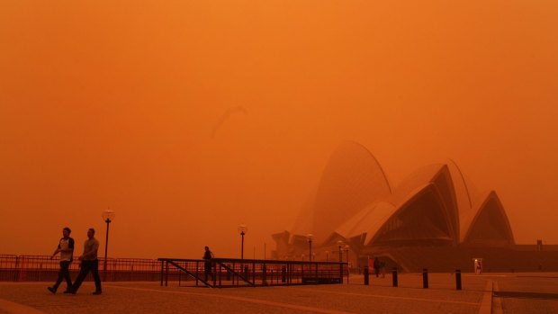 When the bush came to Sydney . . . a blanket of dust obscures the Opera House.