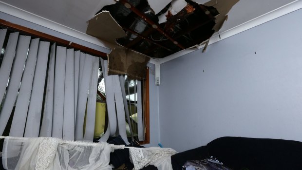 Lucky break: Storm damage to Ben Wright's Raymond Terrace home.