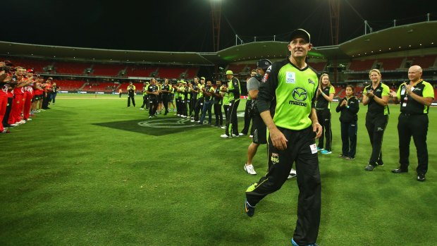 Michael Hussey is given a guard of honour as he leaves the field after Monday night's loss to the Renegades.