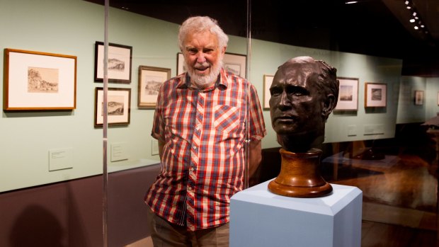 'He was always positive' ... Alan Rees alongside a bust of his late father, Lloyd.