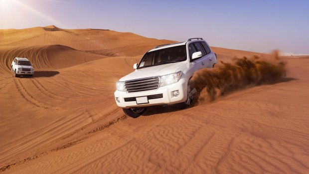 Go dune bashing in Dubai.