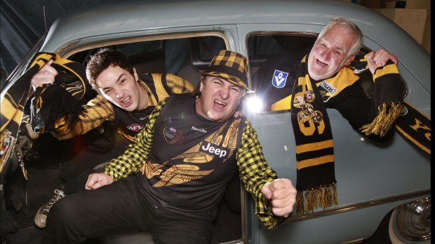 Beau, Brett and Terry Beattie, three generations of diehard Tiger fans, gear up for Richmond's elimination final.