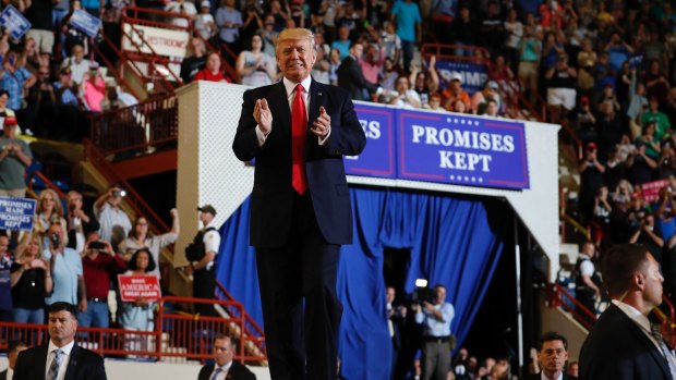 Donald Trump arrives to speak at the Harrisburg rally.