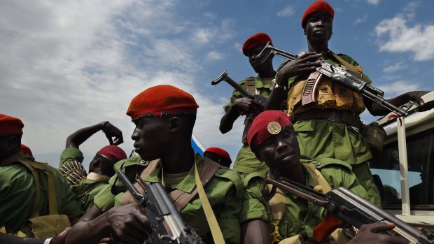 Troops loyal to Riek Machar on patrol in Juba in April, shortly after Machar's return to the capital.