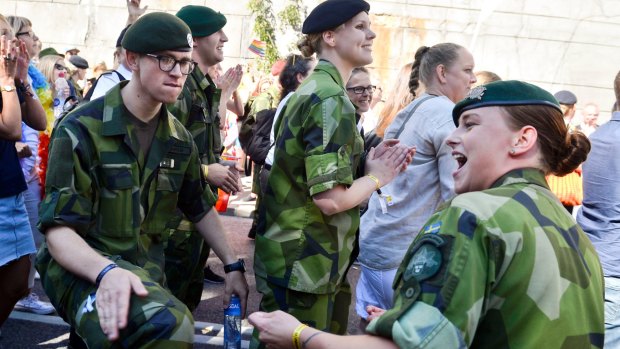Swedish Army personnel take part in the annual gay Pride Parade in Stockholm in 2015.