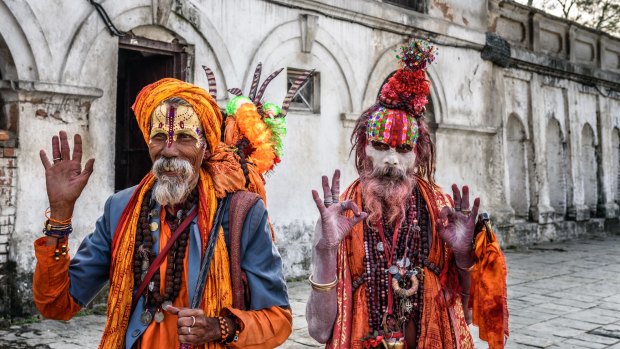 Wandering  Shaiva sadhus (holy men) with traditional body painting in ancient Pashupatinath Temple.