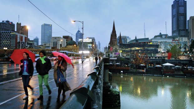 Grim and gloomy: Melbourne only reached 17.3 degrees on Sunday.