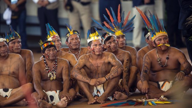 Indigenous representatives listen to Pope Francis in Puerto Maldonado, Peru, on Friday.