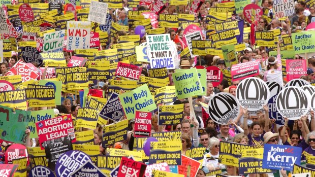 Women march in Washington D.C. in 2004, in defence of abortion rights. 12 years on, the issue is still debated in Queensland. 