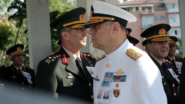 Turkish army's top commanders attend a mass funeral in Ankara after a failed military coup on Thursday.