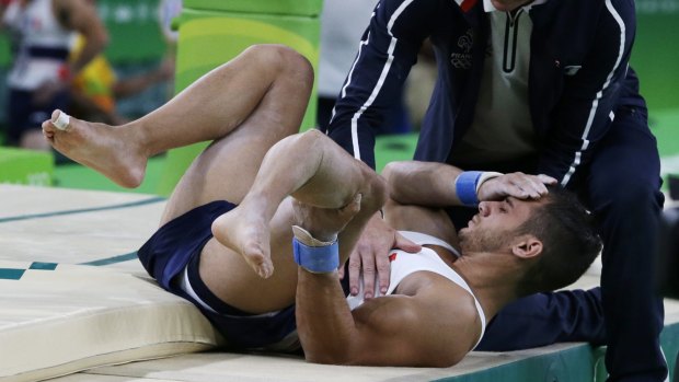 Samir Ait Said in agony after breaking his leg while attempting to land a vault. 