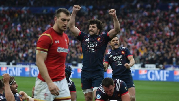 Thrilling: France celebrate their late, late win over Wales.