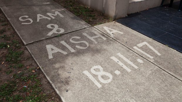 Details of the wedding were written into the footpath outside John Ibrahim's mother's house where the wedding took place.