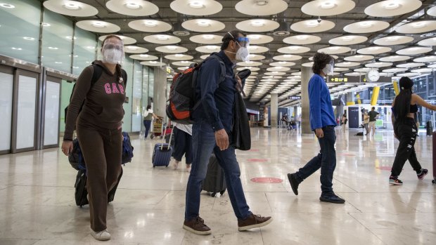 Passengers arrive at Adolfo SuÃ¡rez Madrid-Barajas airport in Madrid, Spain. Spain is open to to vaccinated visitors worldwide as well as non-vaccinated Europeans with a negative antigen test.