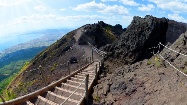 The family used a forbidden trail to climb the summit of the volcano, according to Italian police.